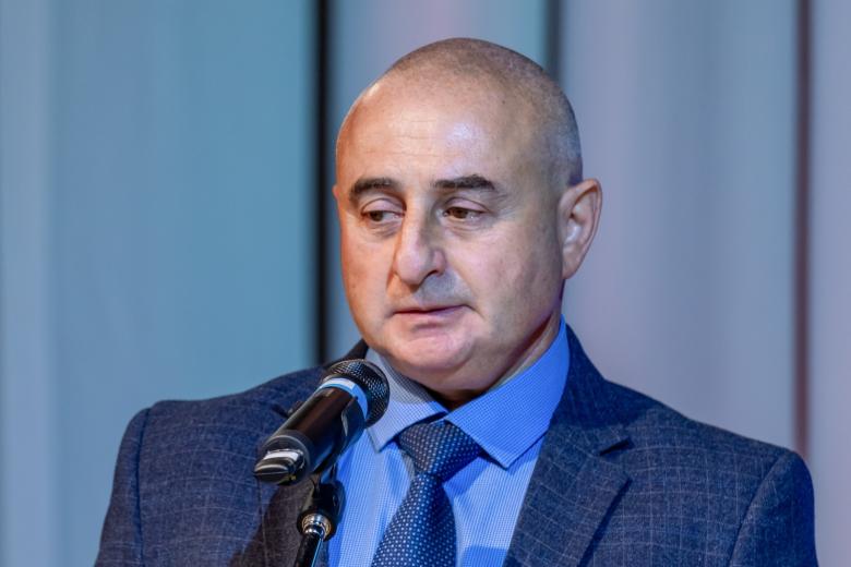 Михаил Каган