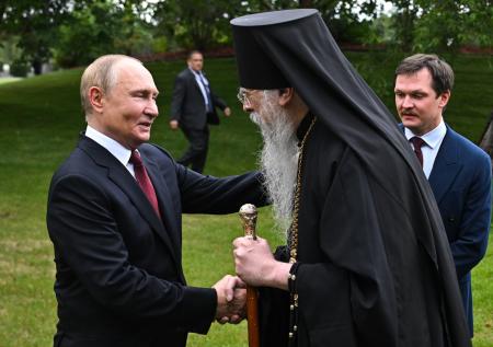 Путин обменялся подарками с американским православным священником