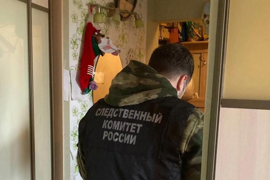 Сотрудники Следственного комитета России на месте убийства