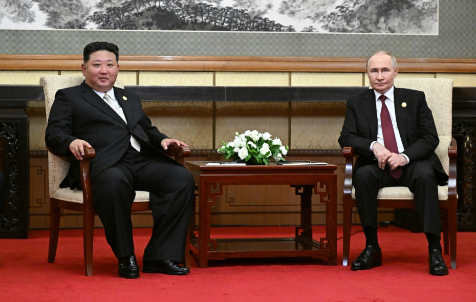Владимир Путин и Ким Чен Ын во время встречи в Пекине