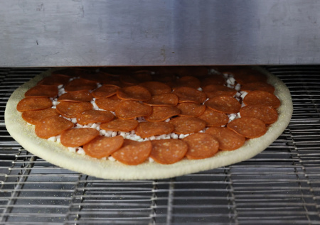 Гастроэнтеролог назвала самые вредные виды пиццы