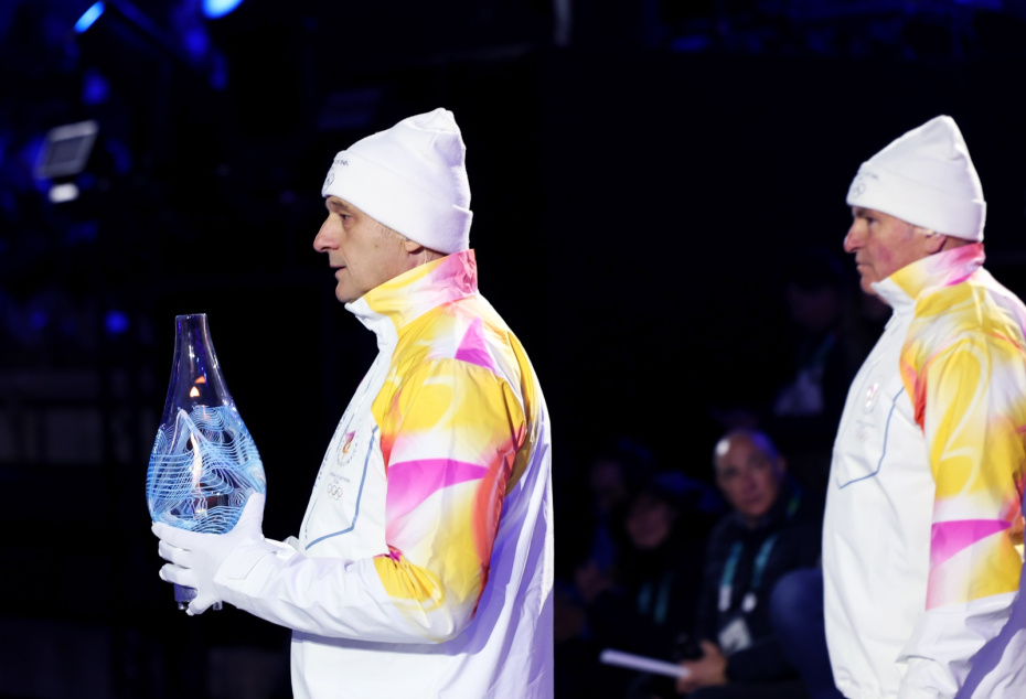 Факелоносцы на церемонии закрытия XXV зимних Олимпийских игр на исторической «Арене ди Верона» в Вероне