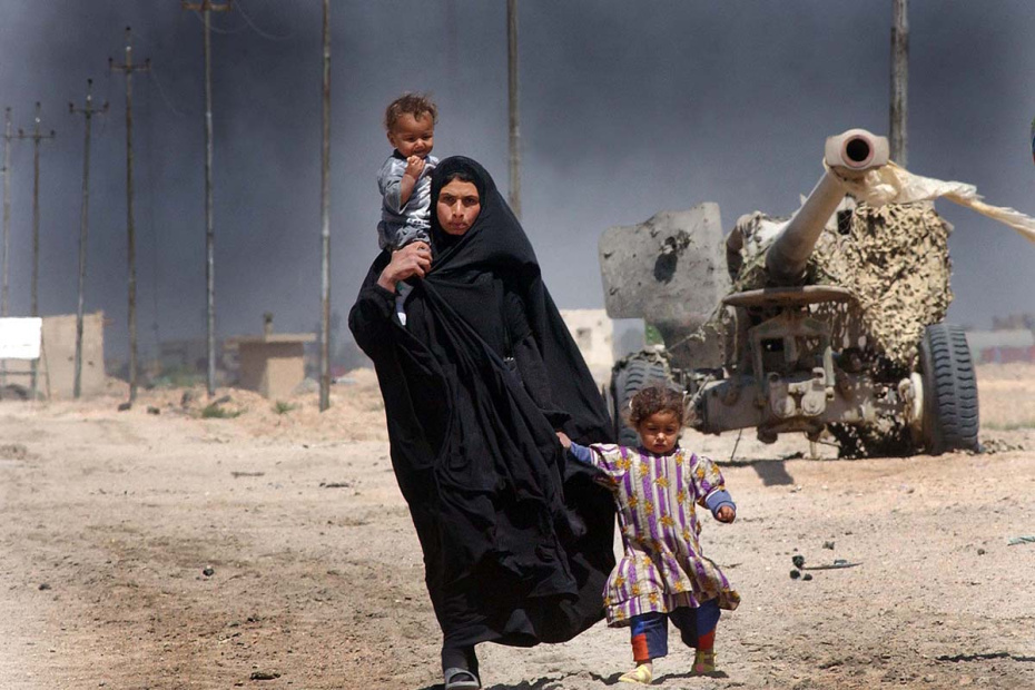 Мирные жители Ирака бегут из Барсы. Март 2003 года