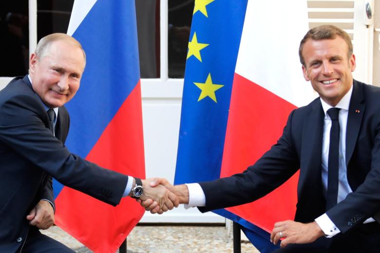 Владимир Путин и Эммануэль Макрон