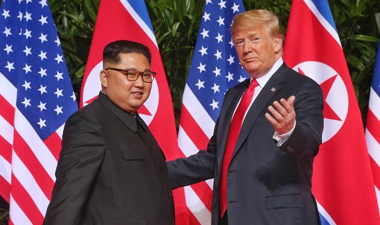 Президент КНДР Ким Чен Ын и президент США Дональд Трамп