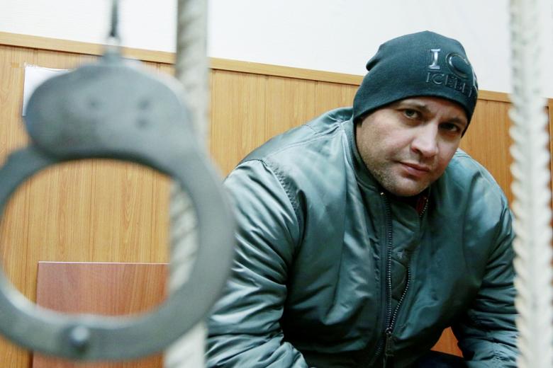 Сергей Хаджикурбанов, обвиняемый по делу об убийстве журналистки Анны Политковской, в зале заседаний Басманного суда, 2012 год