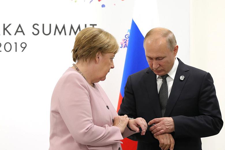 Главы Германии и России Ангела Меркель и Владимир Путин