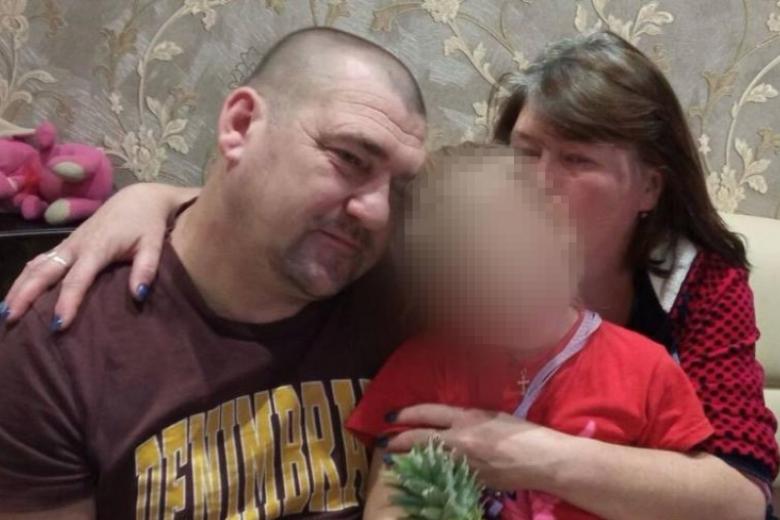 Эдуард и Татьяна Капканец с внучкой