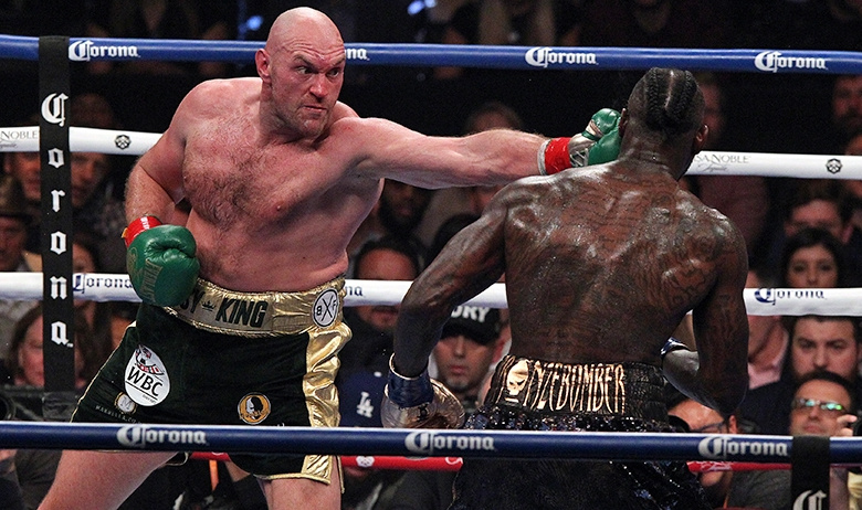 Тайсон Фьюри (слева) 