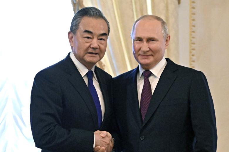 Ван И и Владимир Путин
