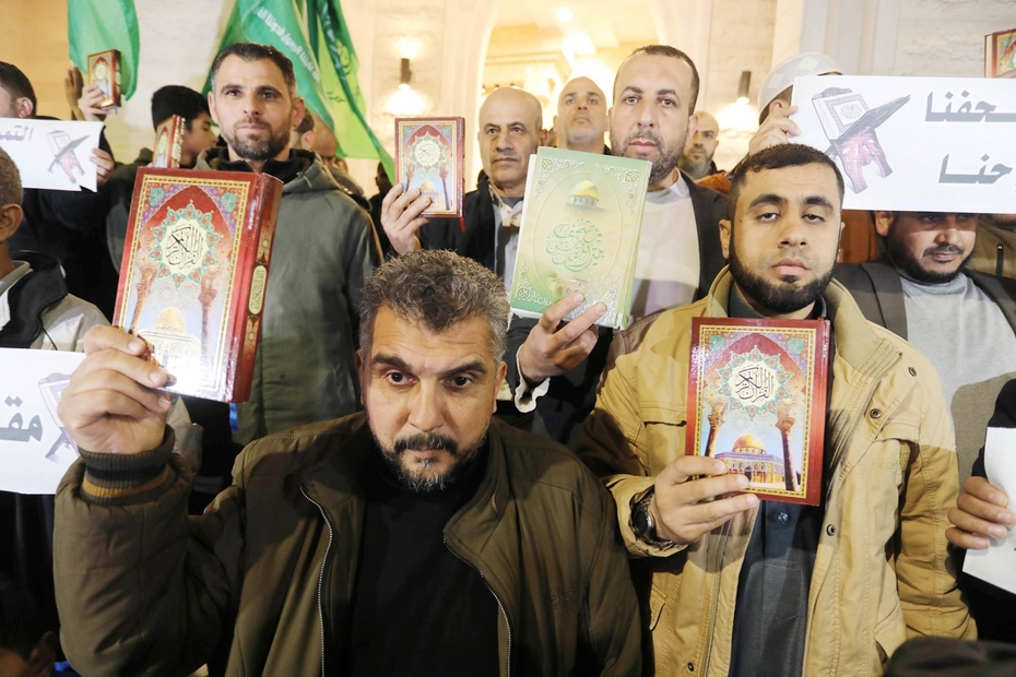  Rafah, Gaza Strip, Palestinian Territory: Palestinians take part in a protest the burning of a copy of the Muslim holy book of Koran by a far-right politician Outside the Turkish Embassy in Stockholm on Saturday, 