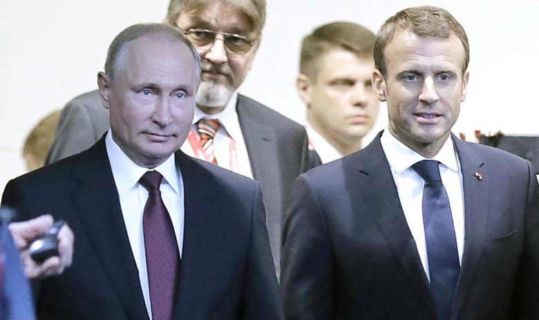 Президенты России и Франции Владимир Путин и Эммануэль Макрон