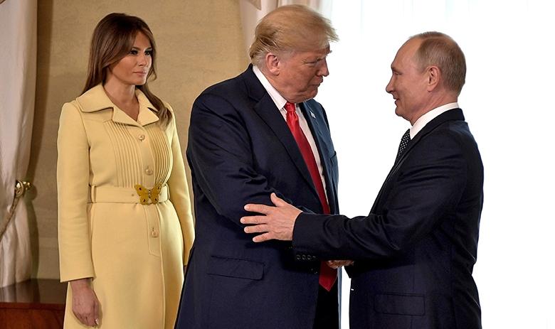 Президенты США И РФ Дональд Трамп с супругой Меланьей и Владимир Путин