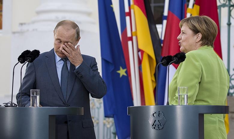 Президент РФ Владимир Путин и канцлер ФРГ Ангела Меркель