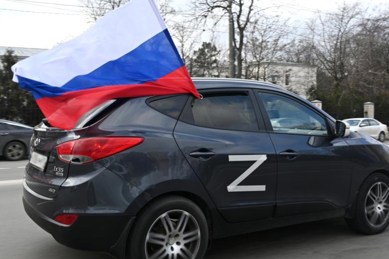 Участник акции в поддержку российских военных
