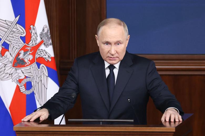 Президент РФ Владимир Путин во время расширенного заседания коллегии Минобороны РФ в Национальном центре управления обороной