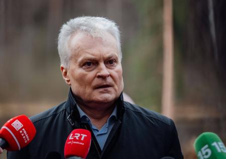 Президент Литвы посетил церемонию прощания с погибшими в Литве военными США