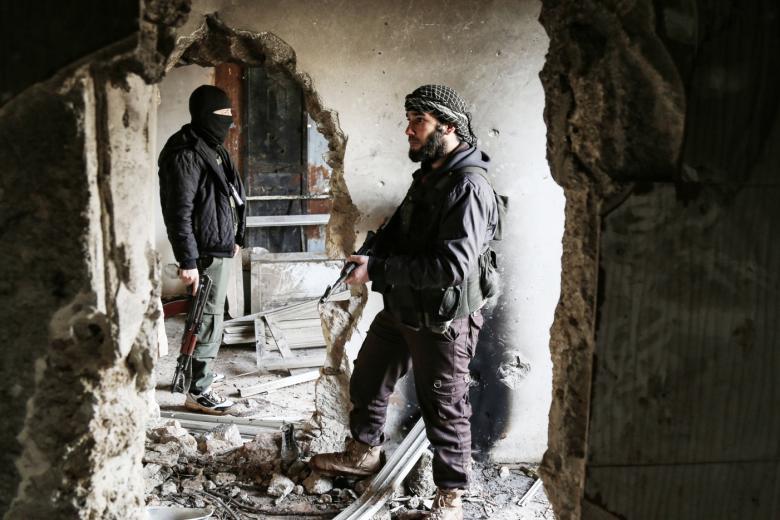 Бойцы группировки боевиков «Хайят Тахрир аш-Шам»