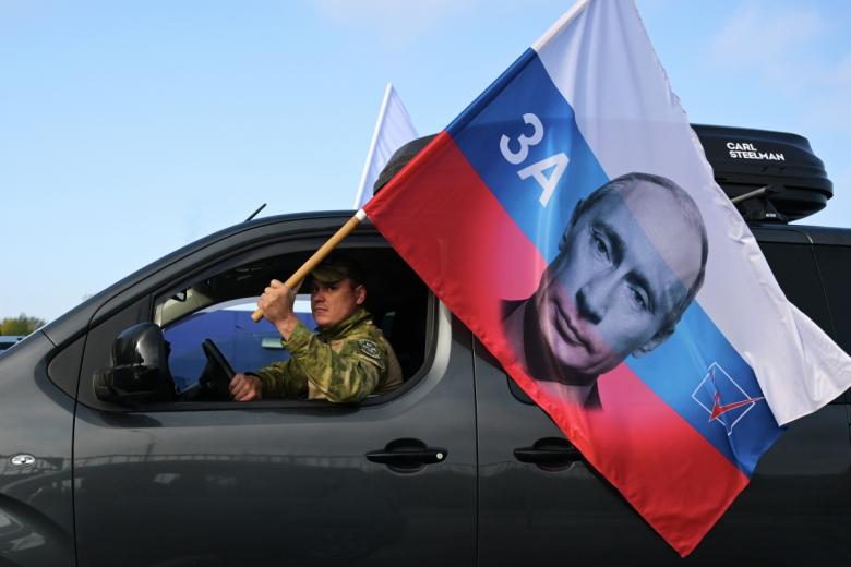 Участник автопробега, посвященного Дню воссоединения новых регионов с Россией
