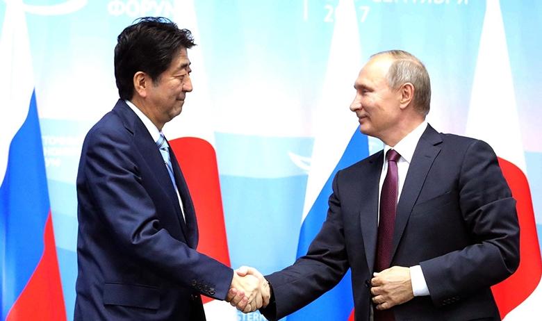 Синдзо Абэ и Владимир Путин