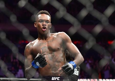 Take it, Иззи: Адесанья становится самым ярким чемпионом UFC
