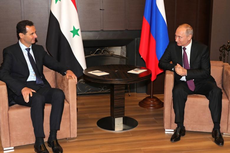 Президент России Владимир Путин с сирийским коллегой Башаром Асадом