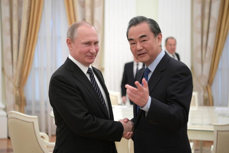 Владимир Путин и Ван И