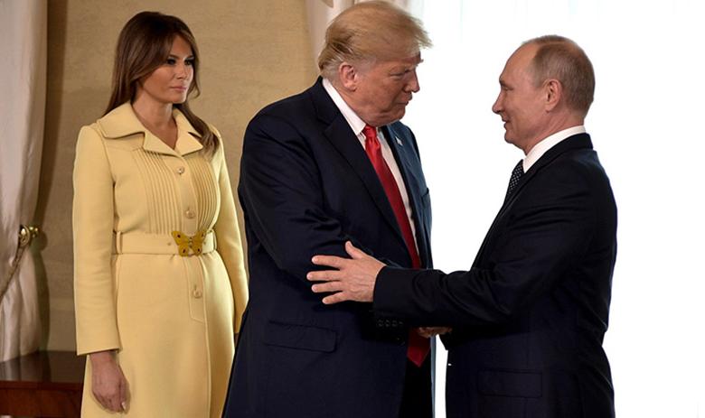 Дональд Трамп с супругой на встрече с президентом РФ Владимиром Путиным