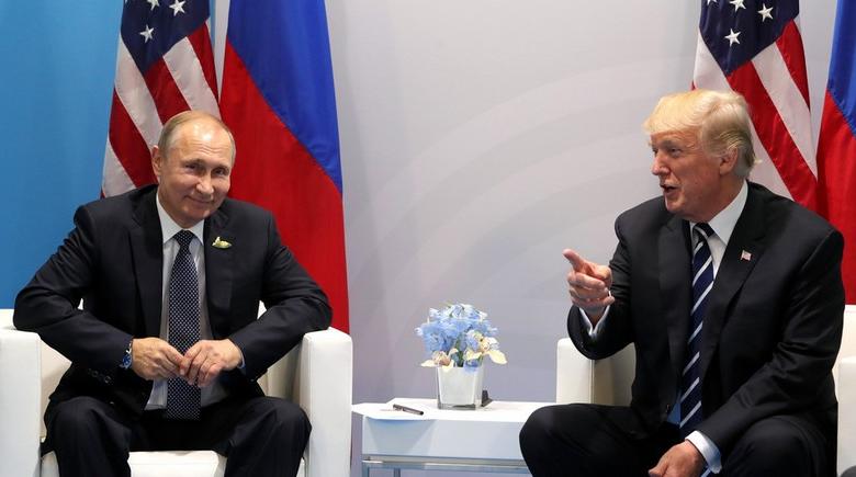 Президент РФ Владимир Путин с президентом США Дональдом Трампом