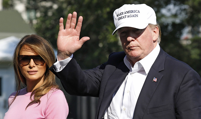 Первая леди США Меланья Трамп и Президент США Дональд Трамп (слева направо)