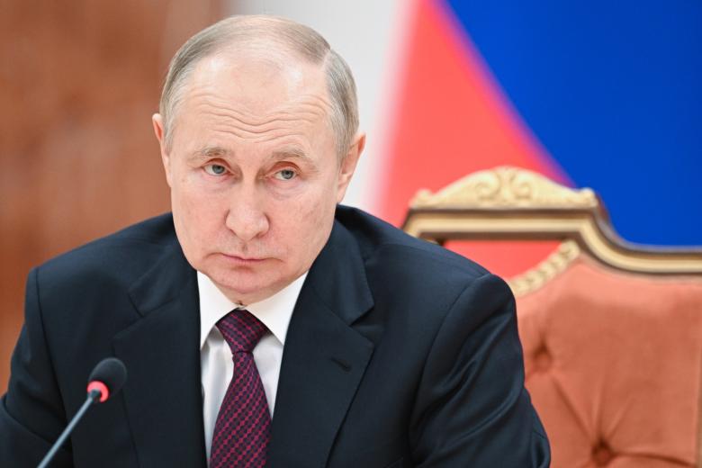 Президент РФ Владимир Путин во время встречи с президентом Белоруссии Александром Лукашенко во Дворце Независимости