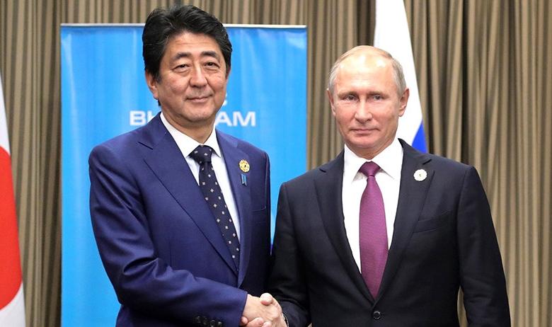 Синдзо Абэ и Владимир Путин