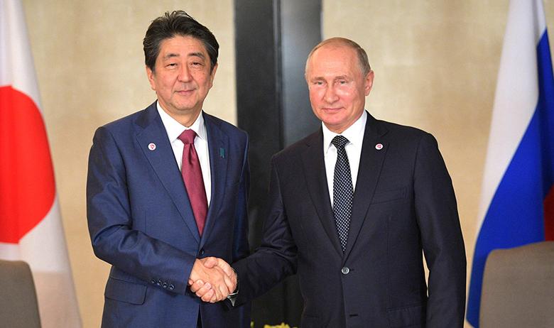 Синдзо Абэ и Владимир Путин