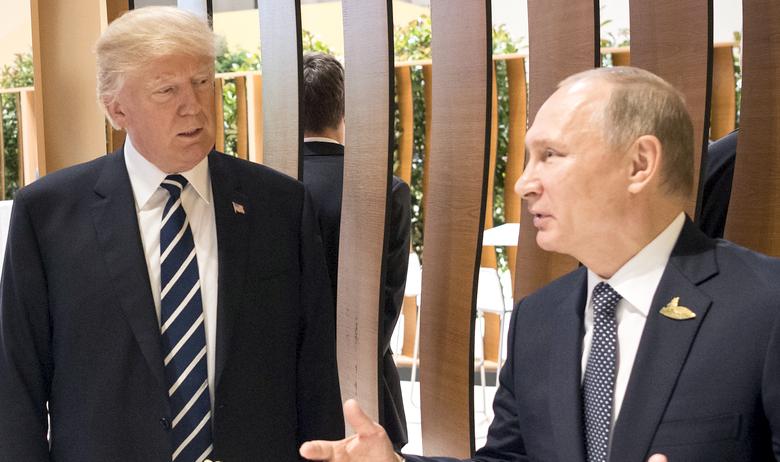 Президент РФ Владимир Путин и лидер США Дональд Трамп