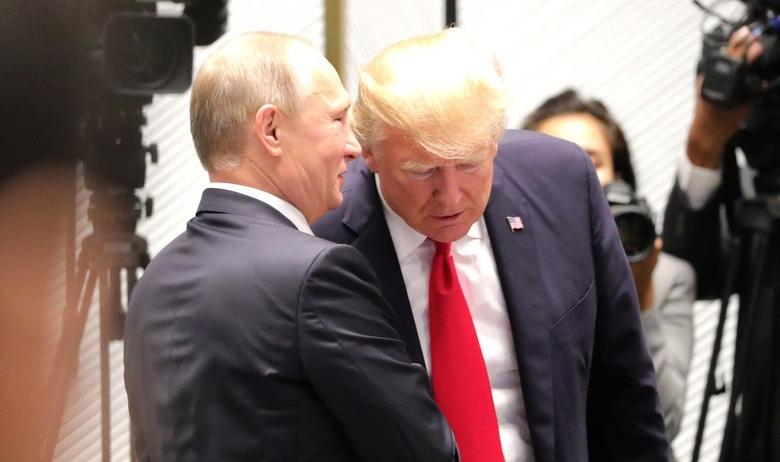 Президент России Владимир Путин с главой США Дональдом Трампом