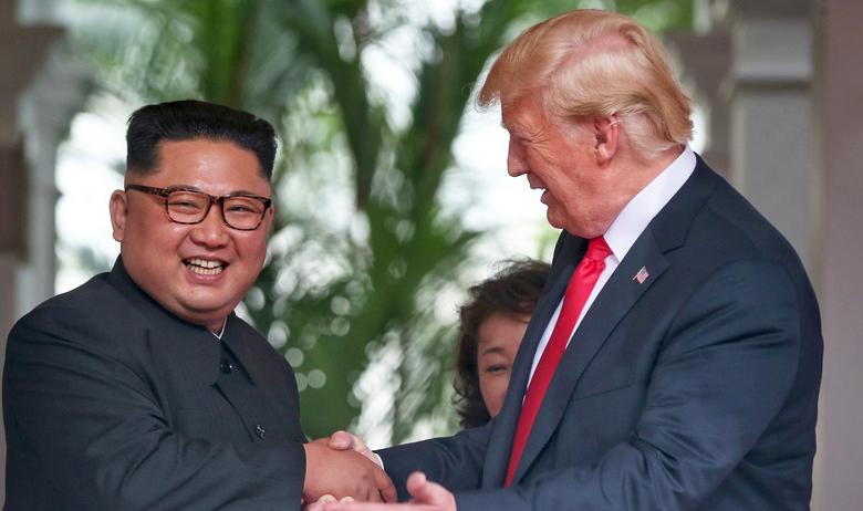 Глава Северной Кореи Ким Чен Ын и президент США Дональд Трамп